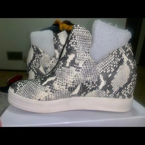 Steve Madden Women’s Snakeprint Wrangle Wedge Shoe